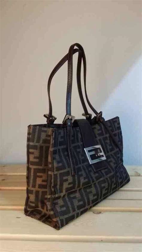 who sells fake fendi|authentic Fendi zucca handbags.